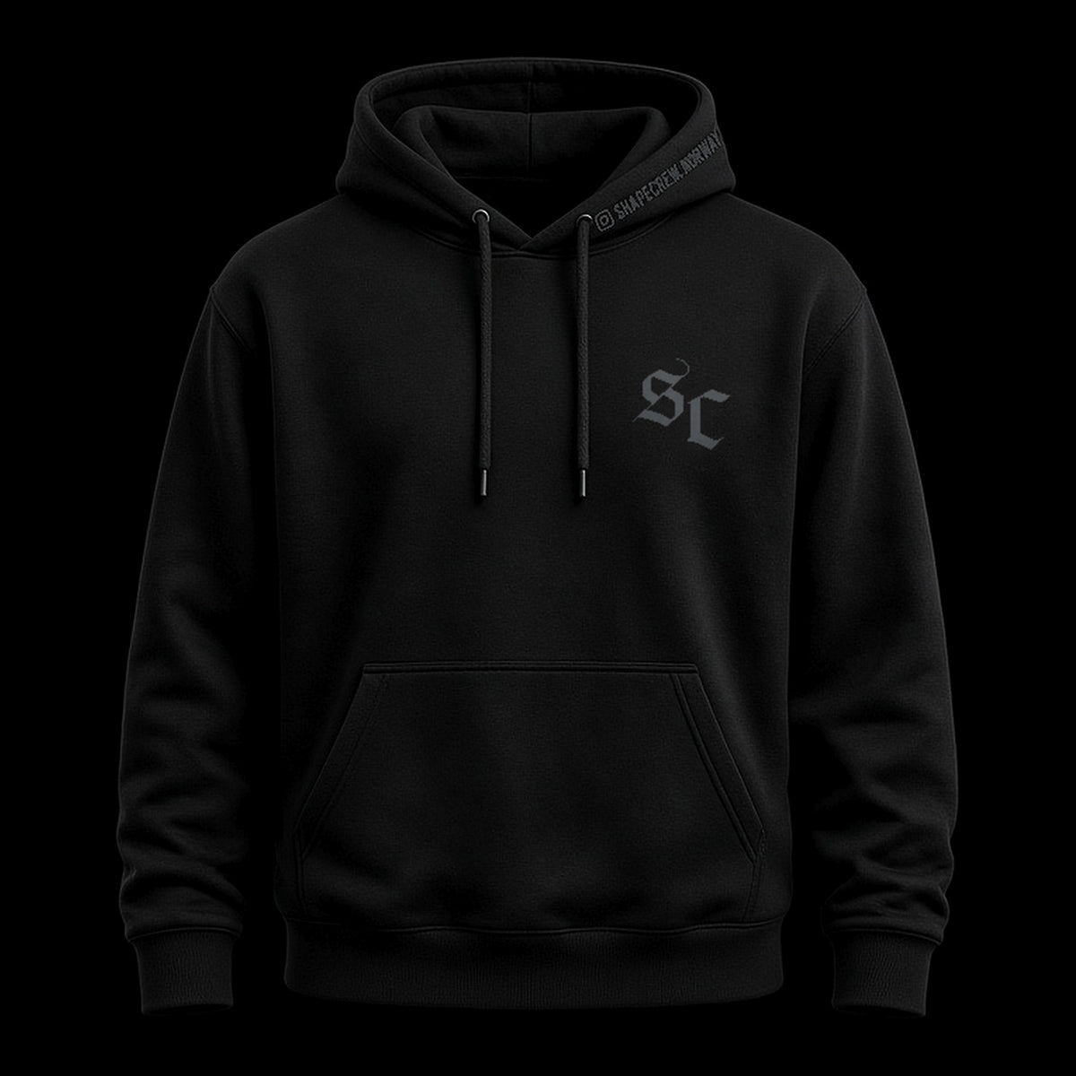 Black Shapecrew hoodie with dark gunmetal SC monogram on the chest, front view